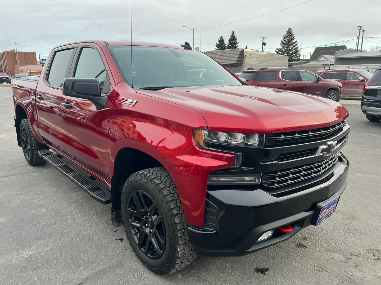 2021 Maroon /Charcoal Chevrolet Silverado 1500 Trail Boss (1GCPYFEL5MZ) with an 6.2L DI V8 engine, automatic transmission, located at 116 5th Avenue South, Lewistown, MT, 59457, 47.063877, -109.427879 - Explore the Rugged Elegance of Our Pre-Owned 2021 Chevrolet Silverado 1500 Crew Cab Trail Boss with a Mighty 6.2L Engine! Unleash the power of the open road with our exceptional 2021 Chevrolet Silverado 1500 Crew Cab Trail Boss. This pre-owned gem is equipped with a formidable 6.2L engine, delive - Photo#0